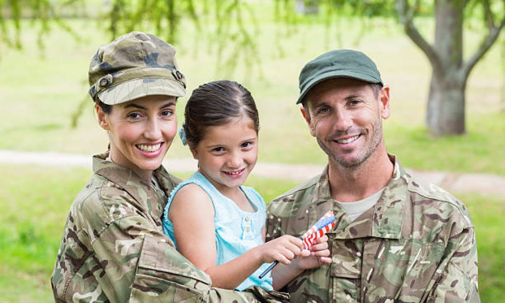 Army parents reunited with their daughter on a sunny day